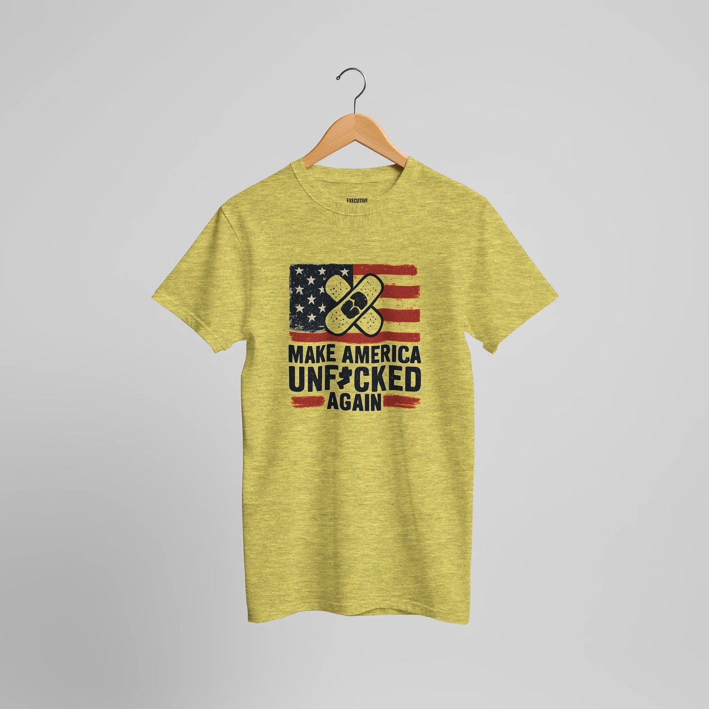 t-shirt with a distressed USA flag and crossed bandage graphic above the slogan “Make America Unf*cked Again.”