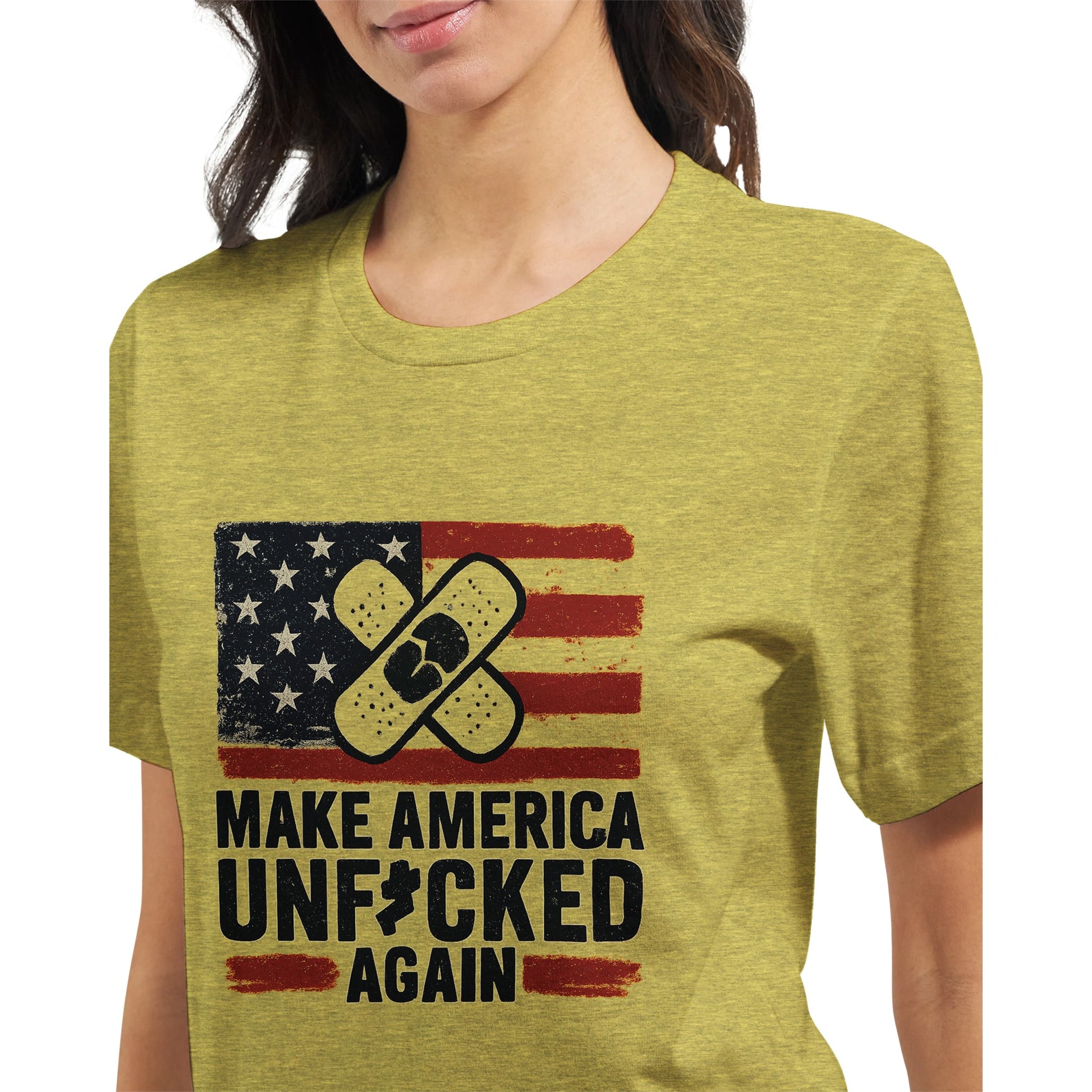 Yellow t-shirt with a distressed USA flag and crossed bandage graphic above the slogan “Make America Unf*cked Again.”