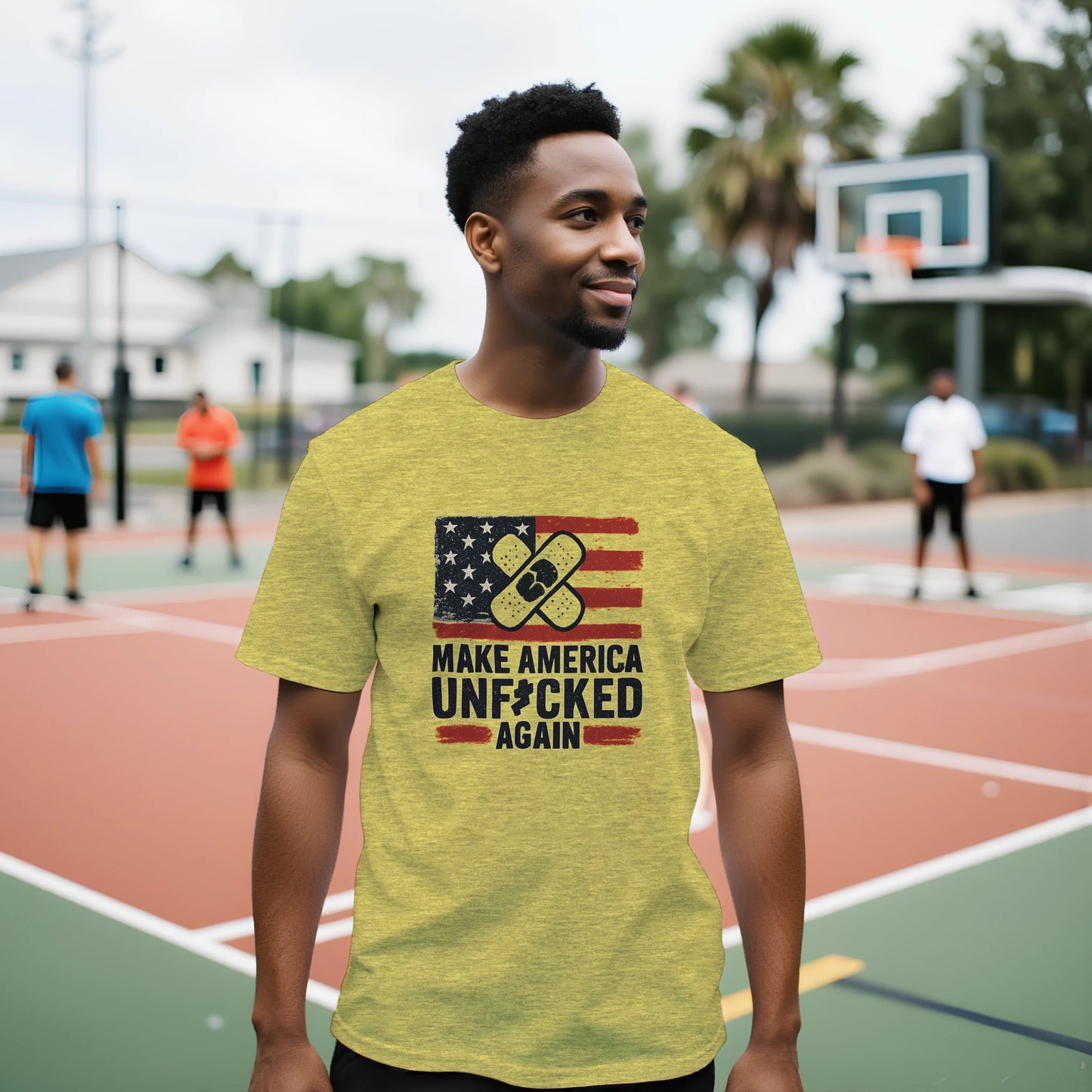 Yellow t-shirt with a distressed USA flag and crossed bandage graphic above the slogan “Make America Unf*cked Again.”
